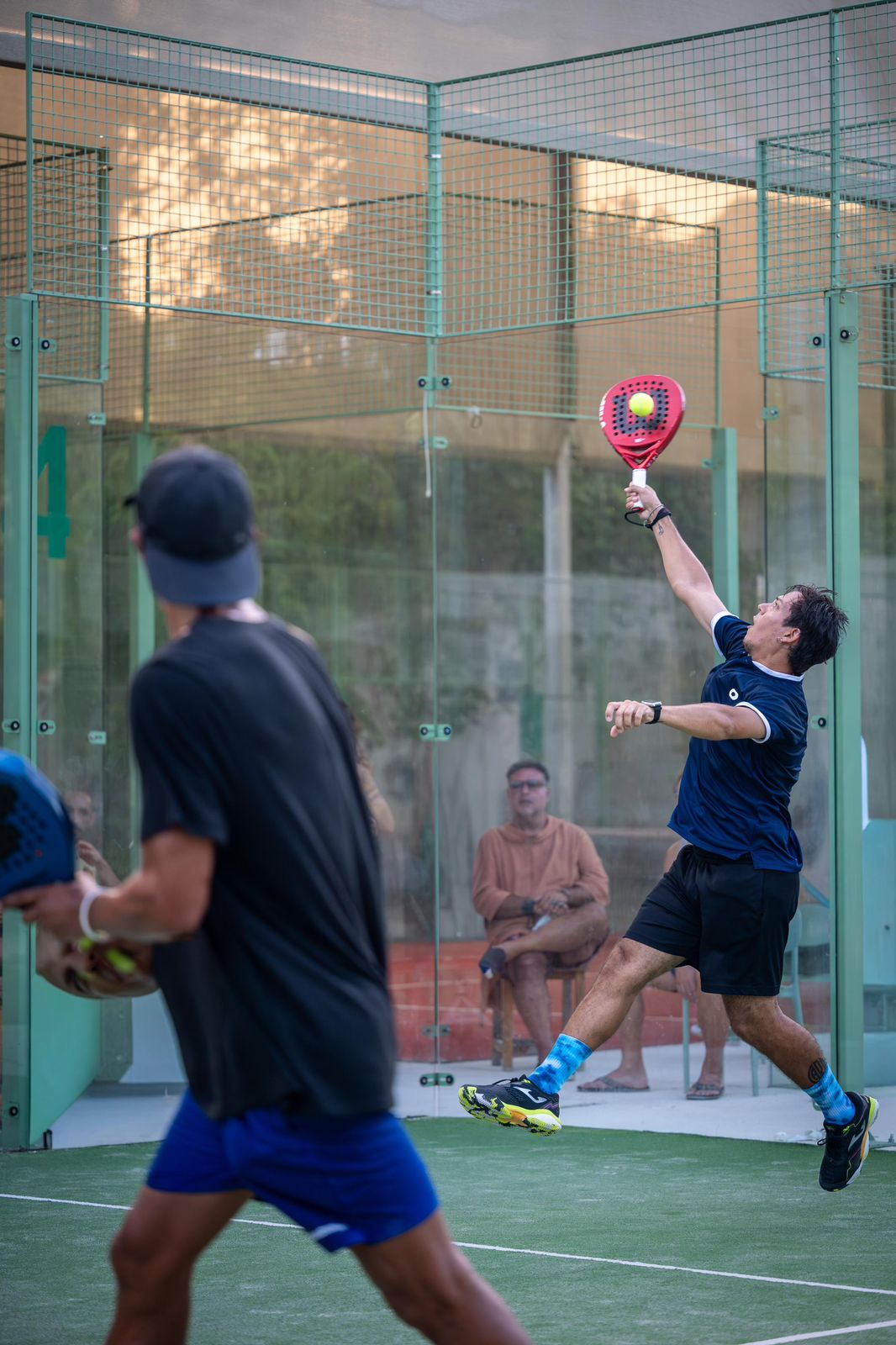 Padel match play in Tulum